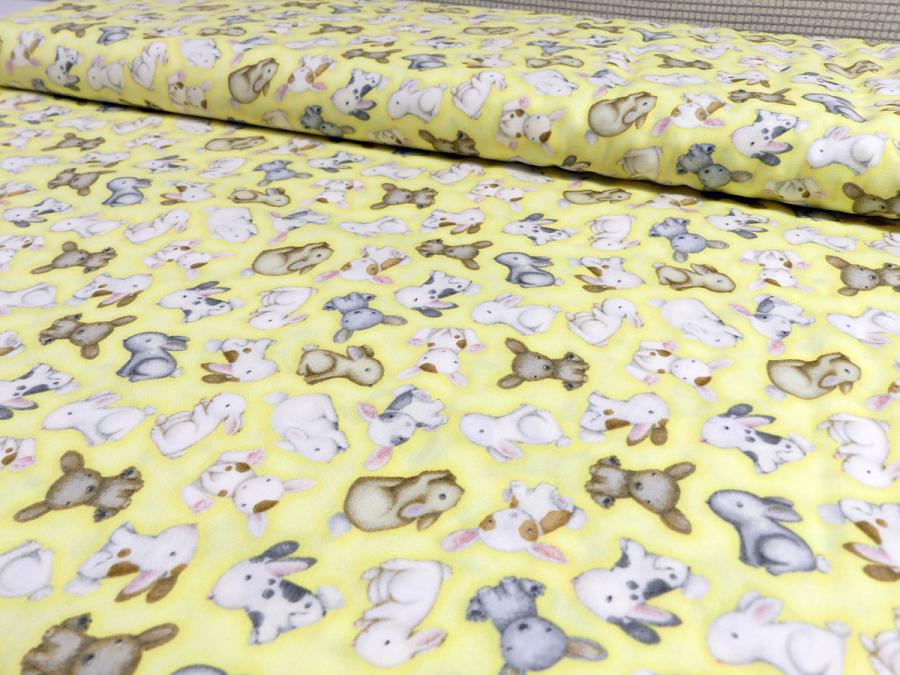 Preview: Patchworkstoff mit Hasenbabies aus der Kollektion Farm Babies auf gelb von Henry Glass Fabrics